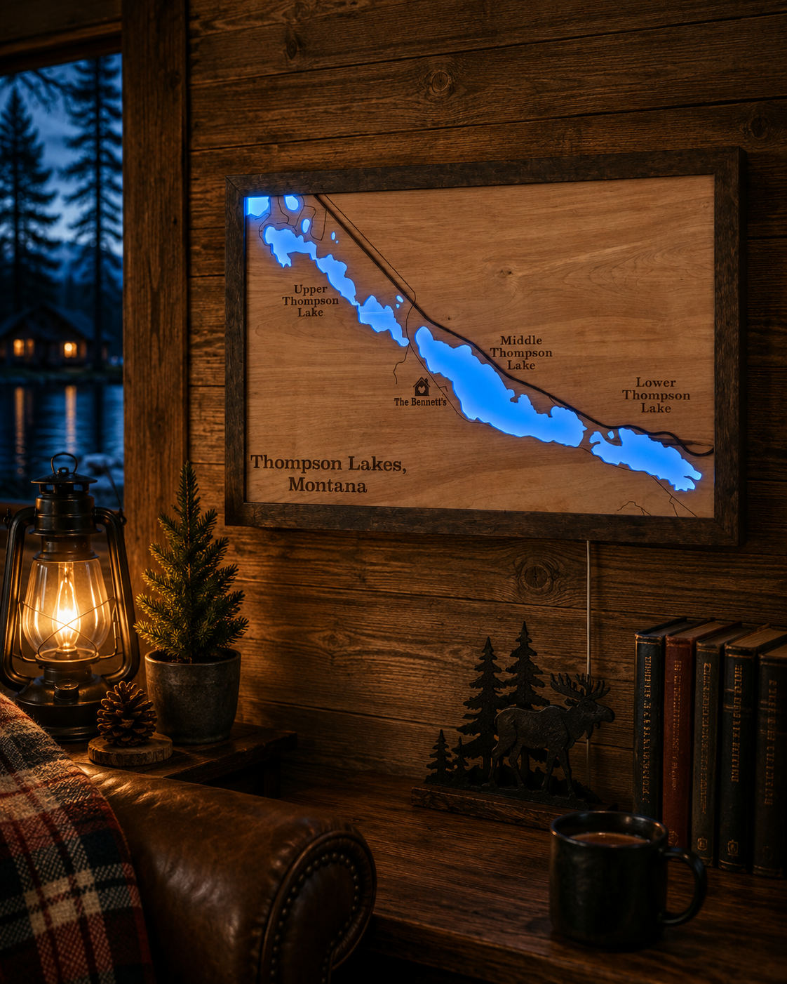 Lighted lake map hanging in a cozy log cabin living room with a leather chair, lantern, and warm lamp light