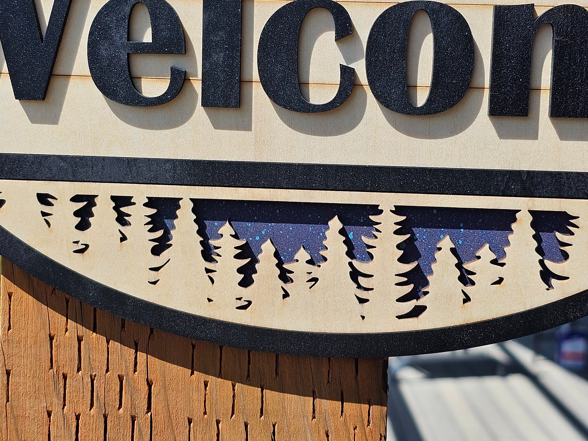Rustic Welcome Sign with Trees & Mountains