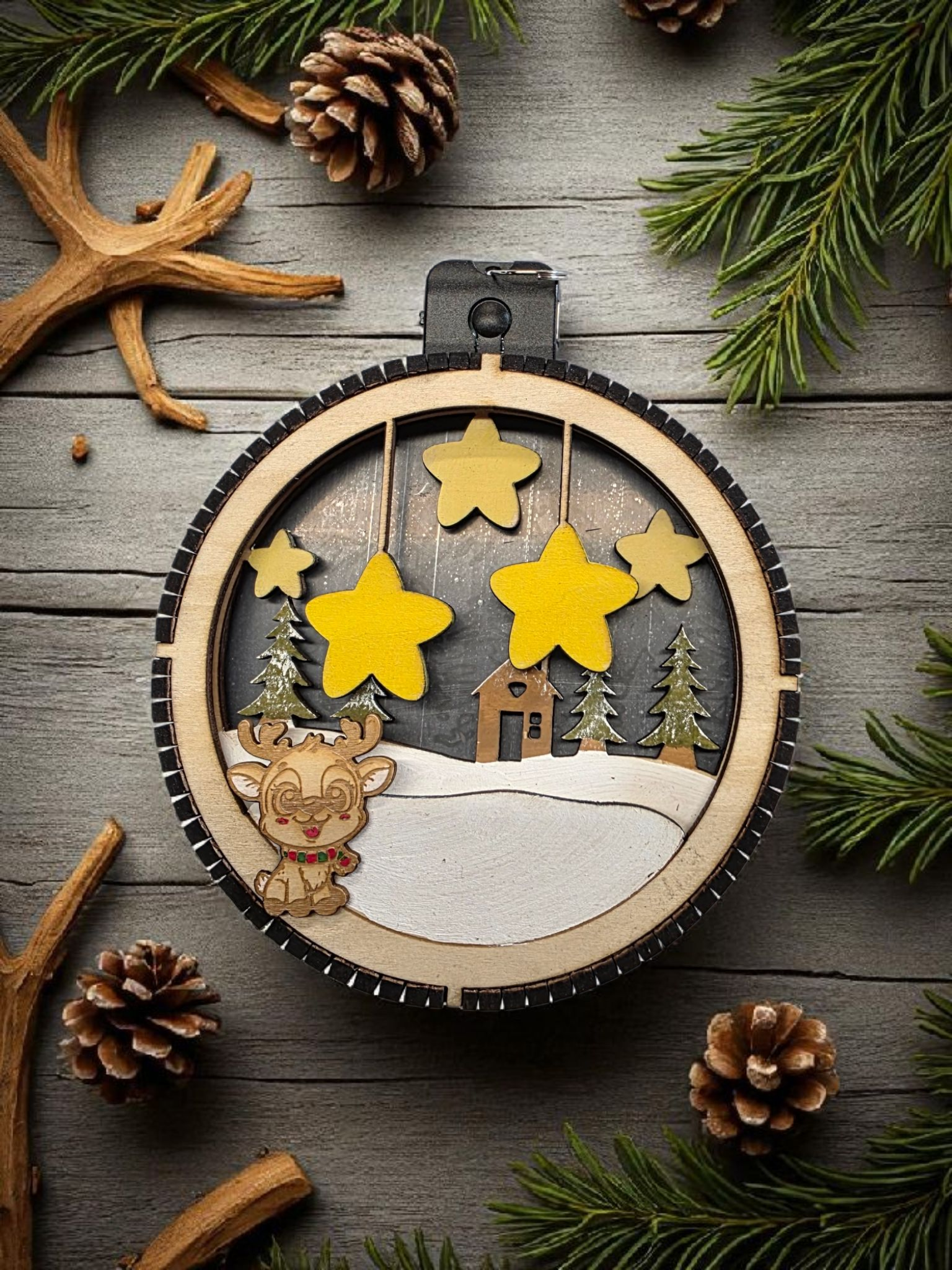 Personalized Family Christmas Ornament with Stars hanging on a tree