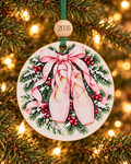 Ballet slippers Christmas ornament with pink pointe shoes on a snowy pine wreath, 4 inch round wood Christmas ornament with 2026 bead by Bandit Laser