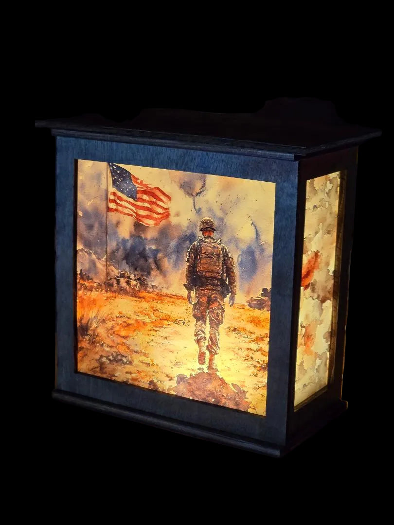 Decorative lamp with a soldier and American flag design on a wooden surface.