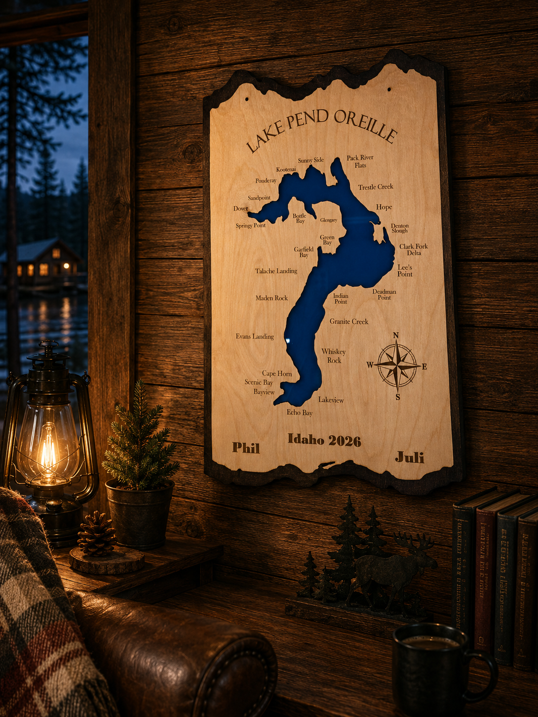 Close-up of personalized Lake Pend Oreille wooden map showing engraved names and date