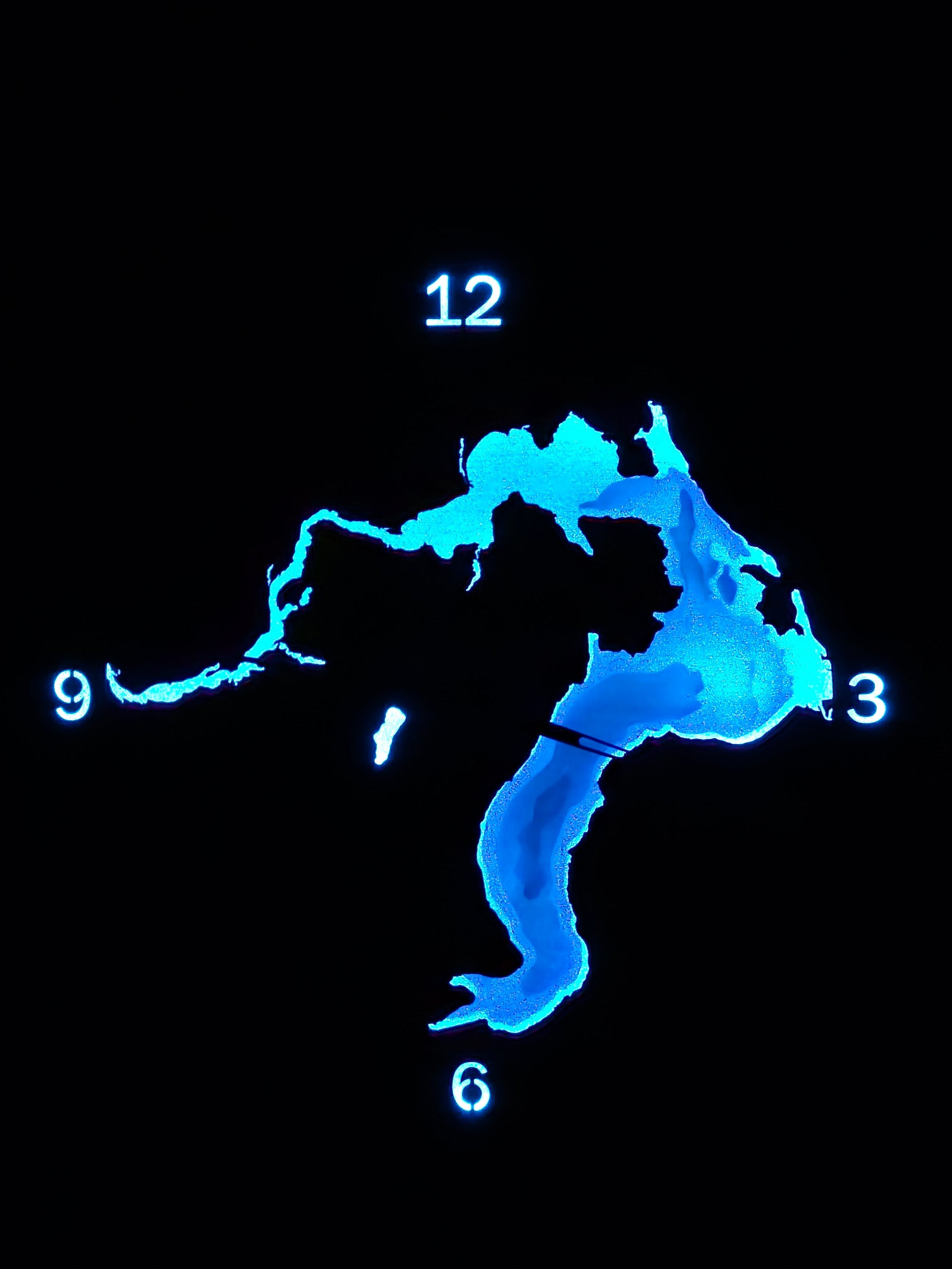 Lake Pend Oreille Depth Map Clock lit at night showing the glowing depth lines